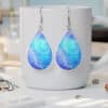 White Fairy Dust with Blue Background Abstract Earrings - Lifestyle