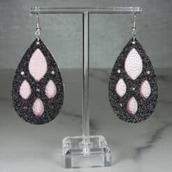 Rose Embossed Faux Leather and Black Glitter Almond Cutout Teardrop Earrings - Front