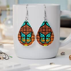 Teal Stained Glass Butterfly on Orange Window Teardrop Earrings - Lifestyle