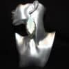 Dark Green and White Glitter with Pastel Green Faux Leather Feather Earrings - Head