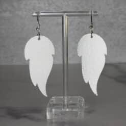 Silver Embossed, Blue Glitter and Leaf Charm Faux Leather Feather Earrings - Back