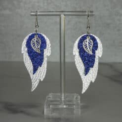 Silver Embossed, Blue Glitter and Leaf Charm Faux Leather Feather Earrings - Front