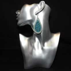 Embossed Teal and Teal Glitter Faux Leather Teardrop Earrings - Head