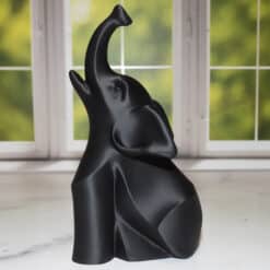 Modern Sitting Elephant Sculpture - Left