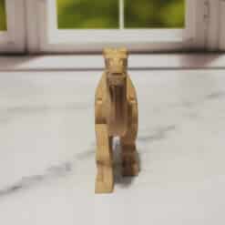 Carved Wood-Style Modern Camel Sculpture - Front