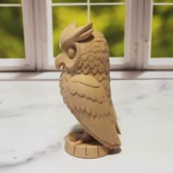 Carved Wood-Style Owl Turning Head Sculpture - Left