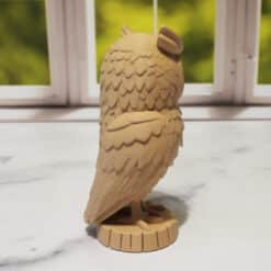 Carved Wood-Style Owl Turning Head Sculpture - Right