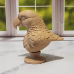 Carved Wood-Style Parrot Bust - Left