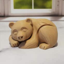 Carved Wood-Style Sleeping Bear Sculpture - Front