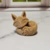 Carved Wood-Style Sleeping Fox Sculpture - Front