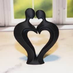 Romantic Couple with Heart Sculpture - Front